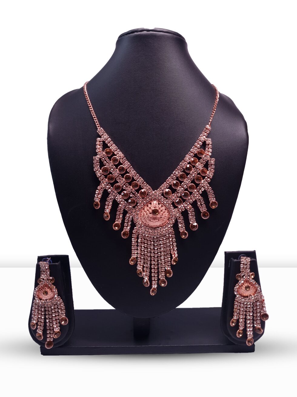 Rose gold plated necklace, earrings, and bracelet jewelry set with matching elegant designs and a luxurious finish.