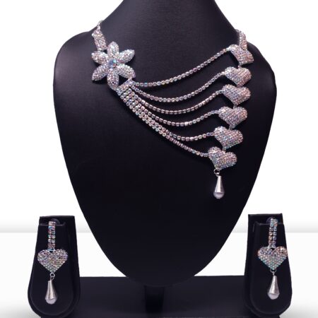 Silver brass cubic zirconia necklace and matching earrings set with elegant stonework and polished finish for any occasion.