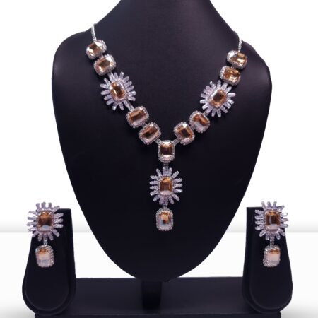 Twinkling diamond necklace and matching earrings set with sparkling stones and a refined finish, ideal for formal events.